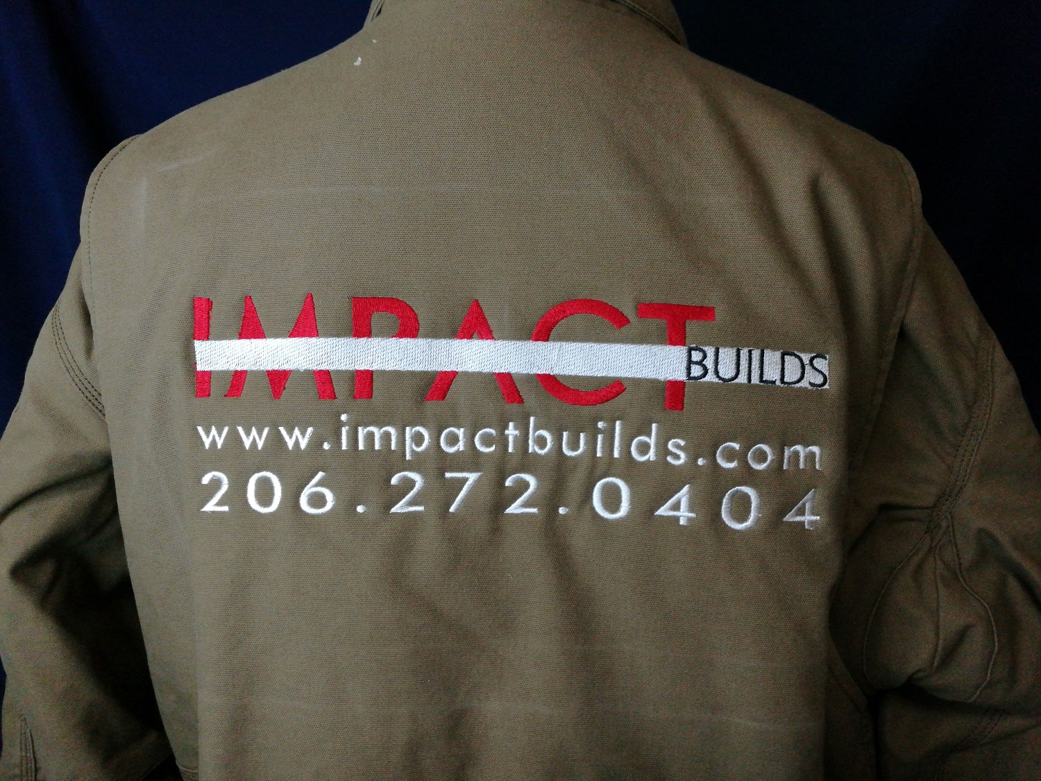 Embroidered logo on a Carhartt jacket