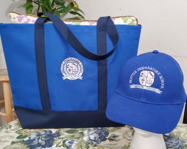 Custom embroidered tote bag and baseball hat with the Seattle Prep High School Mock Trial Team logo