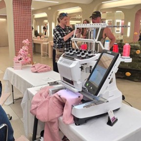 Live Event Embroidery - Glossier Seattle. Personalizing hoodies and tote bags for customers
