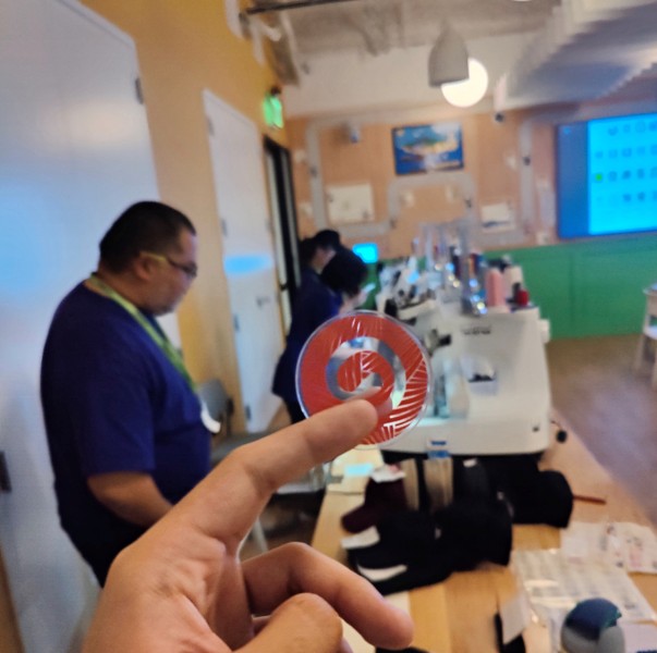 Live Event Embroidery - Pinterest Seattle Team Building. Embroidering baseball hats and beanies.