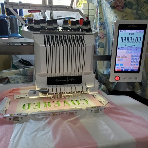 Custom Embroidered beach towels with the words "We;ve Got You Covered" used in RMS Beauty activation in Charleston hosted by Rose-Marie Swift herself